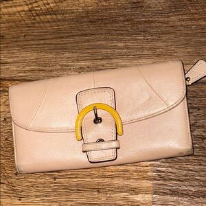 Elegant coach Cream Clutch with Yellow Accent